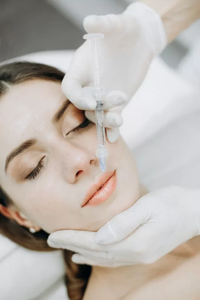 a woman having lip fillers