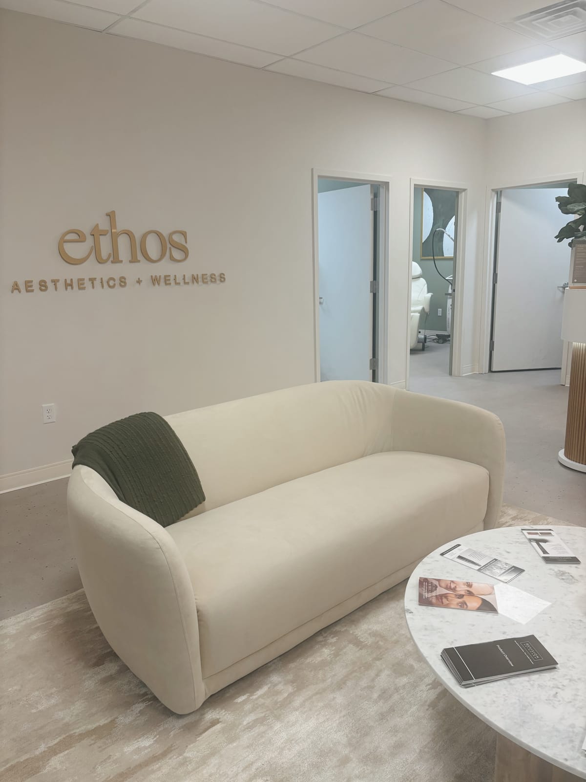 Holmdel Ethos lounge with Ethos sign
