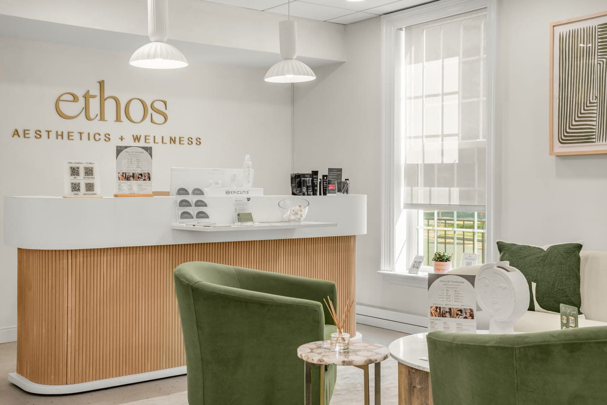Morristown Ethos reception desk with Ethos sign