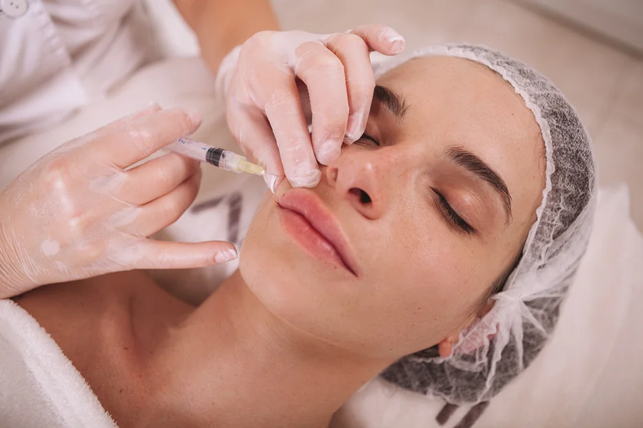 A Woman Getting Lip Filler Treatment