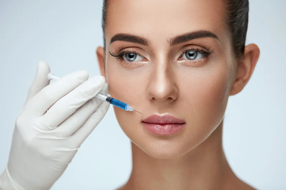 A Woman Getting Hyaluronic Lip Filler Treatment