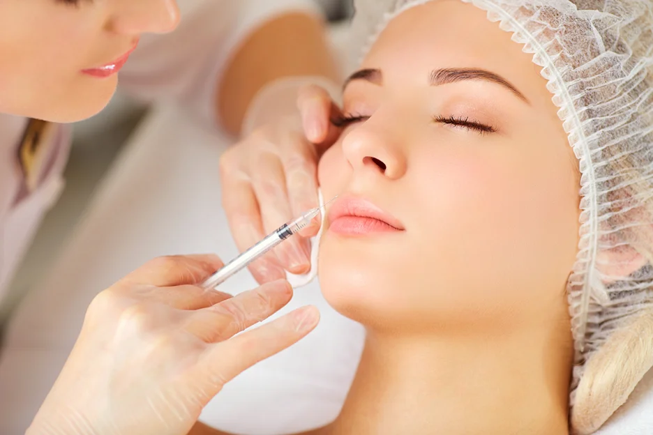 A Woman Getting Lip Filler Treatment