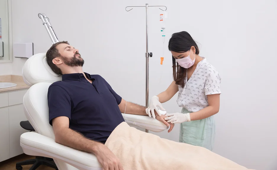 A Man Getting NAD IV Therapy